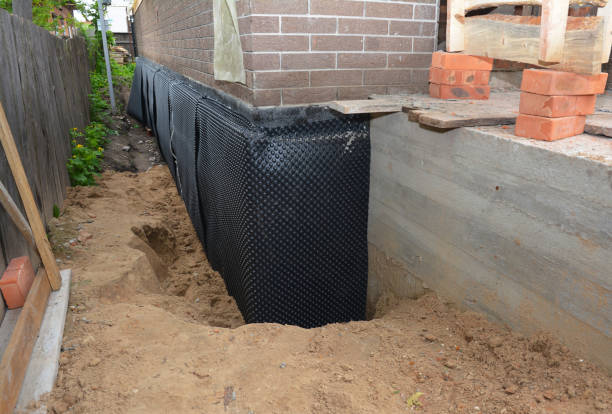 Happy homeowners after waterproofing job in Rockville